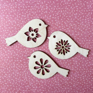 Three birds with flowers